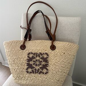 Elegant Straw Tote Bag with Brown Accents
